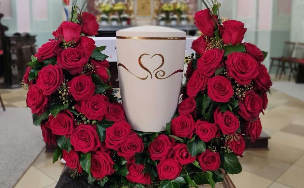 Hand-Carved Rosewood Urn (URW051)<br><em> A unique wooden urn showcasing detailed hand-carved artistry.</em>